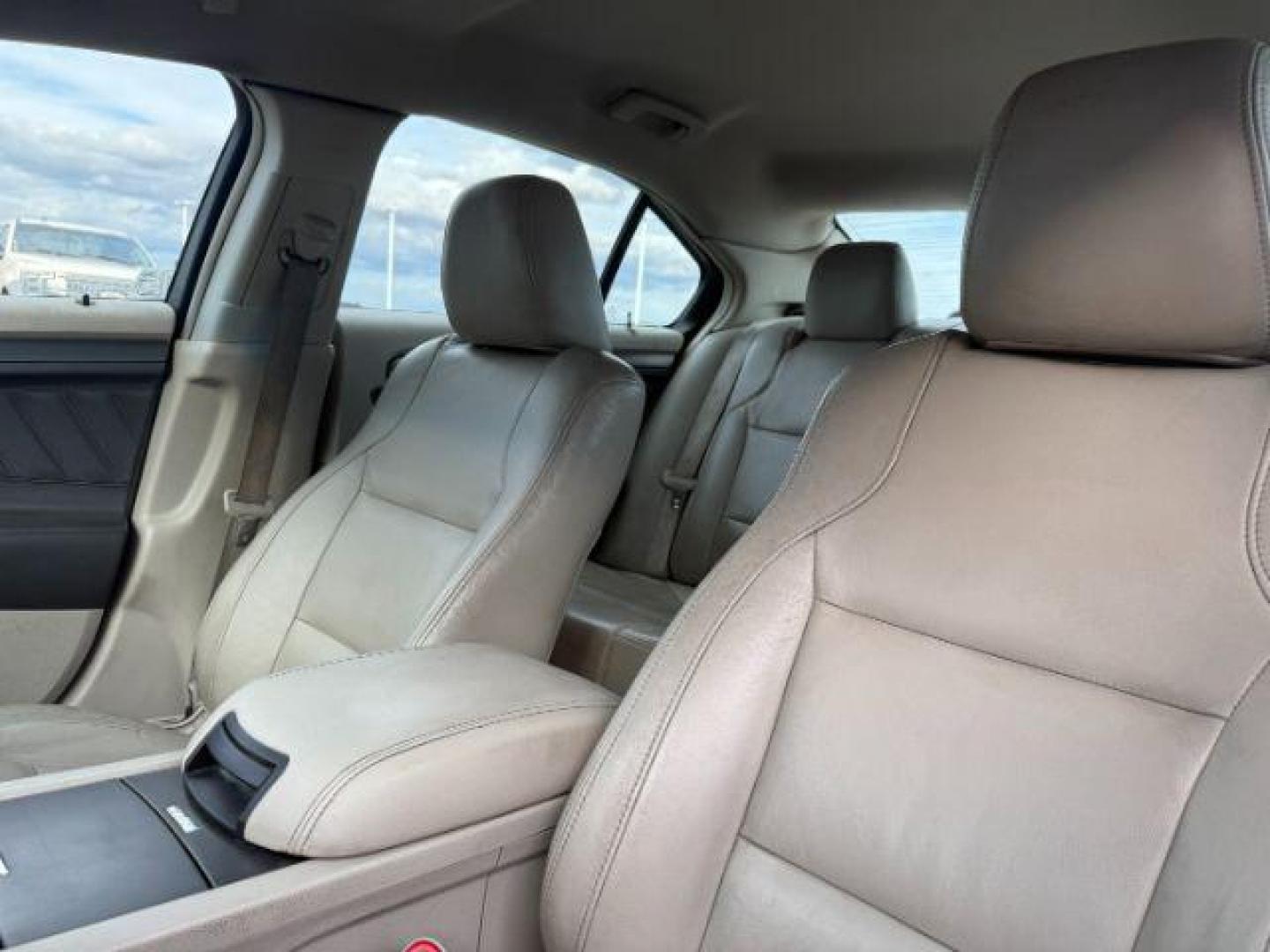 2011 RED /Charcoal Black Ford Taurus (1FAHP2HW3BG) with an Duratec 35L V-6 DOHC engine, Automatic transmission, located at 1175 N Woodruff Ave, Idaho Falls, ID, 83401, 43.506901, -111.999657 - At Timberline Auto, finding a great deal on your next vehicle is always easy! Our experienced sales staff's goal is to help find you the right vehicle at the right price! Our knowledgeable finance department has options for almost any credit score. We offer extended service contract options to prote - Photo#13