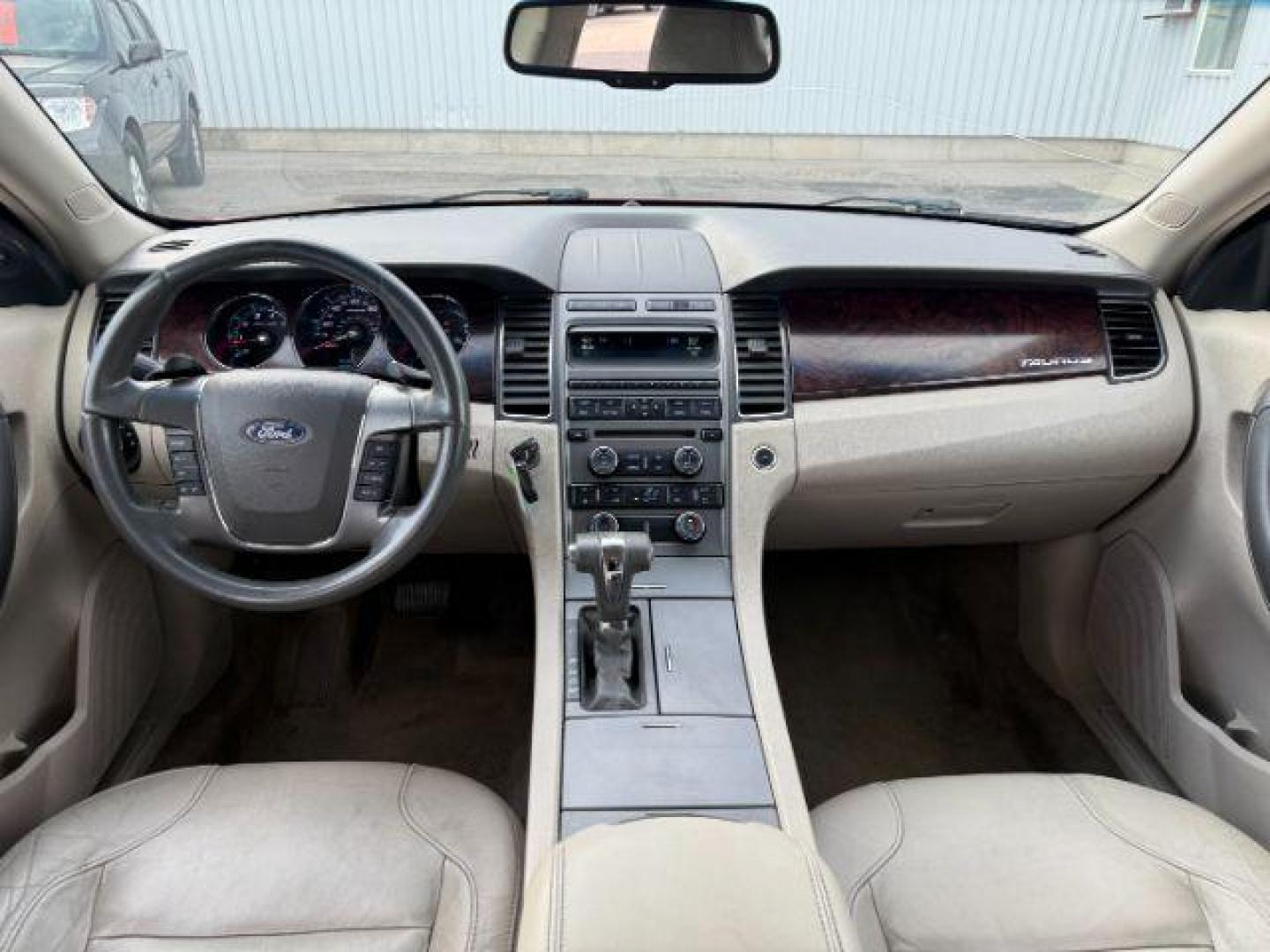 2011 RED /Charcoal Black Ford Taurus (1FAHP2HW3BG) with an Duratec 35L V-6 DOHC engine, Automatic transmission, located at 1175 N Woodruff Ave, Idaho Falls, ID, 83401, 43.506901, -111.999657 - At Timberline Auto, finding a great deal on your next vehicle is always easy! Our experienced sales staff's goal is to help find you the right vehicle at the right price! Our knowledgeable finance department has options for almost any credit score. We offer extended service contract options to prote - Photo#15