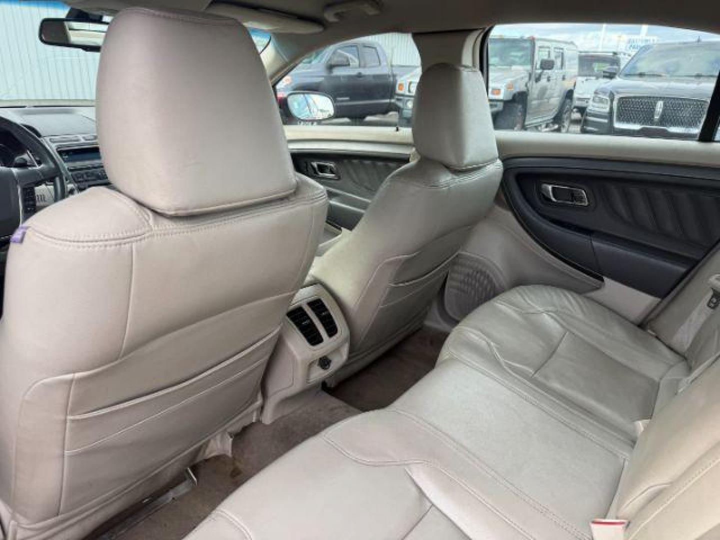 2011 RED /Charcoal Black Ford Taurus (1FAHP2HW3BG) with an Duratec 35L V-6 DOHC engine, Automatic transmission, located at 1175 N Woodruff Ave, Idaho Falls, ID, 83401, 43.506901, -111.999657 - At Timberline Auto, finding a great deal on your next vehicle is always easy! Our experienced sales staff's goal is to help find you the right vehicle at the right price! Our knowledgeable finance department has options for almost any credit score. We offer extended service contract options to prote - Photo#16