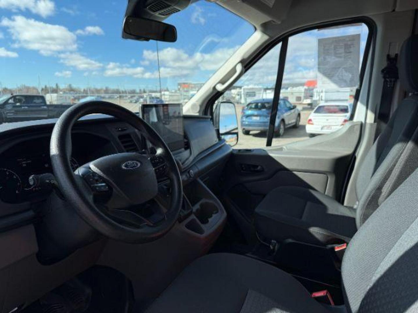 2022 Oxford White /Ebony Ford Transit-350 Passenger Van (1FBAX9C82NK) with an 35L V-6 portdirect injection engine, Automatic transmission, located at 1175 N Woodruff Ave, Idaho Falls, ID, 83401, 43.506901, -111.999657 - At Timberline Auto, finding a great deal on your next vehicle is always easy! Our experienced sales staff's goal is to help find you the right vehicle at the right price! Our knowledgeable finance department has options for almost any credit score. We offer extended service contract options to prote - Photo#35