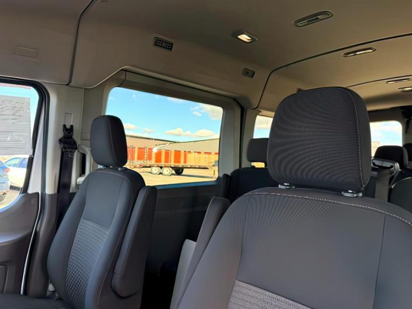 2022 Oxford White /Ebony Ford Transit-350 Passenger Van (1FBAX9C82NK) with an 35L V-6 portdirect injection engine, Automatic transmission, located at 1175 N Woodruff Ave, Idaho Falls, ID, 83401, 43.506901, -111.999657 - At Timberline Auto, finding a great deal on your next vehicle is always easy! Our experienced sales staff's goal is to help find you the right vehicle at the right price! Our knowledgeable finance department has options for almost any credit score. We offer extended service contract options to prote - Photo#18
