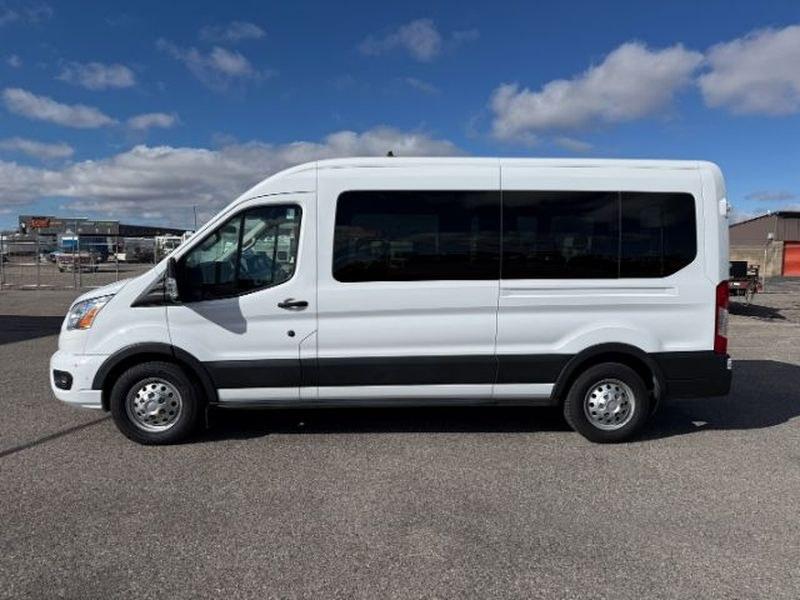 2022 Oxford White /Ebony Ford Transit Wagon XLT (1FBAX9C82NK) with an V6, 3.5L engine, 10-speed automatic transmission, located at 1175 N Woodruff Ave, Idaho Falls, ID, 83401, 43.506901, -111.999657 - <b>Vehicle Details</b><br>Discover the versatility and confidence of this pre-owned 2022 Ford Transit Wagon T-350 Med Roof Slide XL, a smart choice for families, shuttle service, or business use. With only 47,829 miles, this spacious passenger van delivers the capability you need with the comfort yo- Photo#1