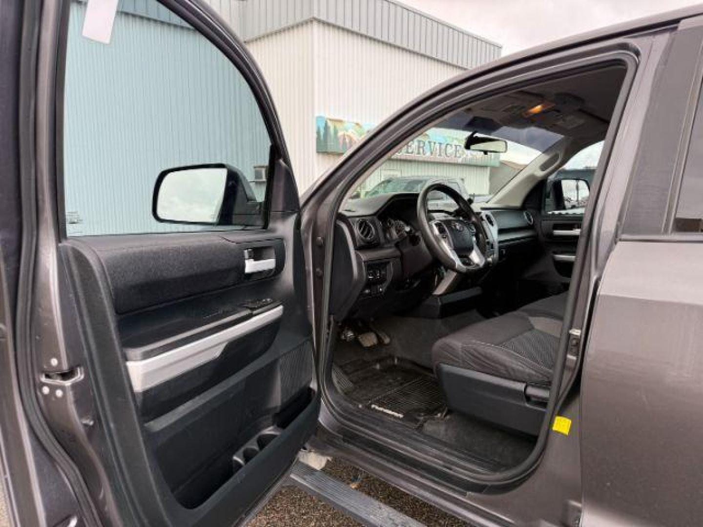 2016 Magnetic Gray Metallic /Black Toyota Tundra (5TFDY5F12GX) with an I-FORCE 57L V-8 DOHC engine, Automatic transmission, located at 1175 N Woodruff Ave, Idaho Falls, ID, 83401, 43.506901, -111.999657 - At Timberline Auto, finding a great deal on your next vehicle is always easy! Our experienced sales staff's goal is to help find you the right vehicle at the right price! Our knowledgeable finance department has options for almost any credit score. We offer extended service contract options to prote - Photo#37