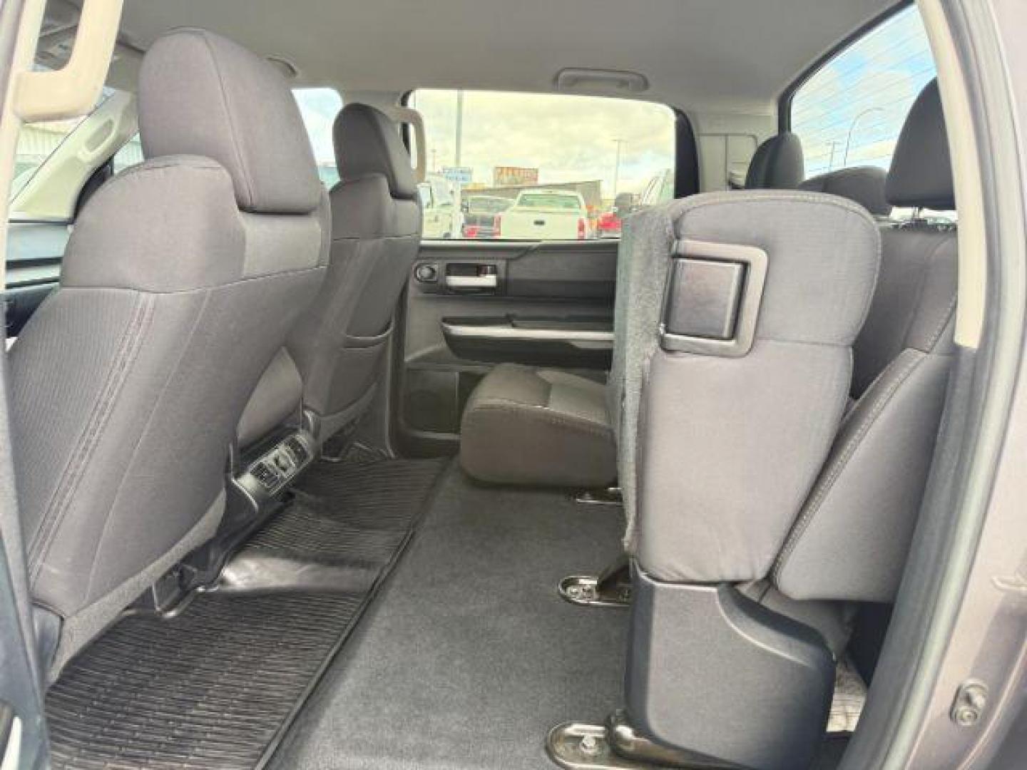 2016 Magnetic Gray Metallic /Black Toyota Tundra (5TFDY5F12GX) with an I-FORCE 57L V-8 DOHC engine, Automatic transmission, located at 1175 N Woodruff Ave, Idaho Falls, ID, 83401, 43.506901, -111.999657 - At Timberline Auto, finding a great deal on your next vehicle is always easy! Our experienced sales staff's goal is to help find you the right vehicle at the right price! Our knowledgeable finance department has options for almost any credit score. We offer extended service contract options to prote - Photo#52