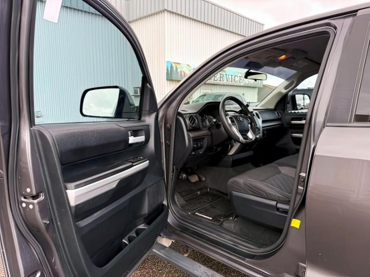 2016 Magnetic Gray Metallic /Black Toyota Tundra (5TFDY5F12GX) with an I-FORCE 57L V-8 DOHC engine, Automatic transmission, located at 1175 N Woodruff Ave, Idaho Falls, ID, 83401, 43.506901, -111.999657 - At Timberline Auto, finding a great deal on your next vehicle is always easy! Our experienced sales staff's goal is to help find you the right vehicle at the right price! Our knowledgeable finance department has options for almost any credit score. We offer extended service contract options to prote - Photo#10