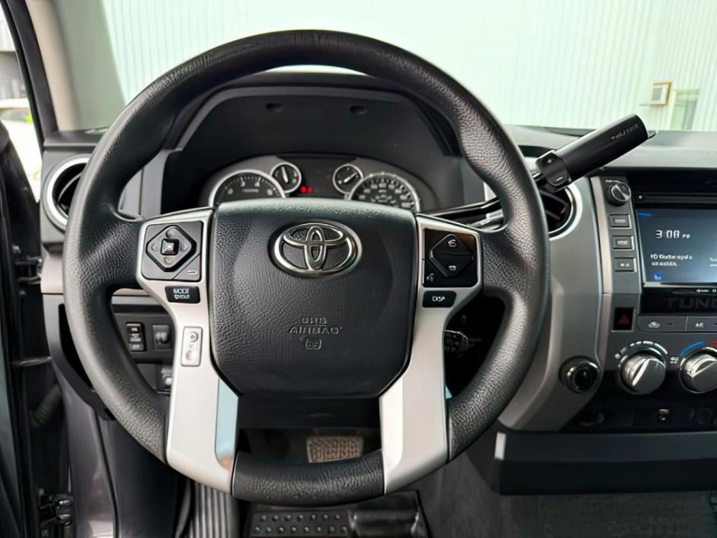 2016 Magnetic Gray Metallic /Black Toyota Tundra (5TFDY5F12GX) with an I-FORCE 57L V-8 DOHC engine, Automatic transmission, located at 1175 N Woodruff Ave, Idaho Falls, ID, 83401, 43.506901, -111.999657 - At Timberline Auto, finding a great deal on your next vehicle is always easy! Our experienced sales staff's goal is to help find you the right vehicle at the right price! Our knowledgeable finance department has options for almost any credit score. We offer extended service contract options to prote - Photo#13