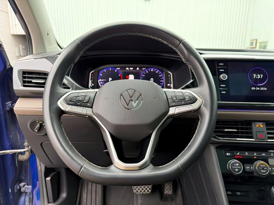2022 Cornflower Blue /Gray/Black Volkswagen Taos (3VV2X7B2XNM) with an 15L I-4 gasoline direct injection engine, Automatic transmission, located at 1175 N Woodruff Ave, Idaho Falls, ID, 83401, 43.506901, -111.999657 - At Timberline Auto, finding a great deal on your next vehicle is always easy! Our experienced sales staff's goal is to help find you the right vehicle at the right price! Our knowledgeable finance department has options for almost any credit score. We offer extended service contract options to prote - Photo#13