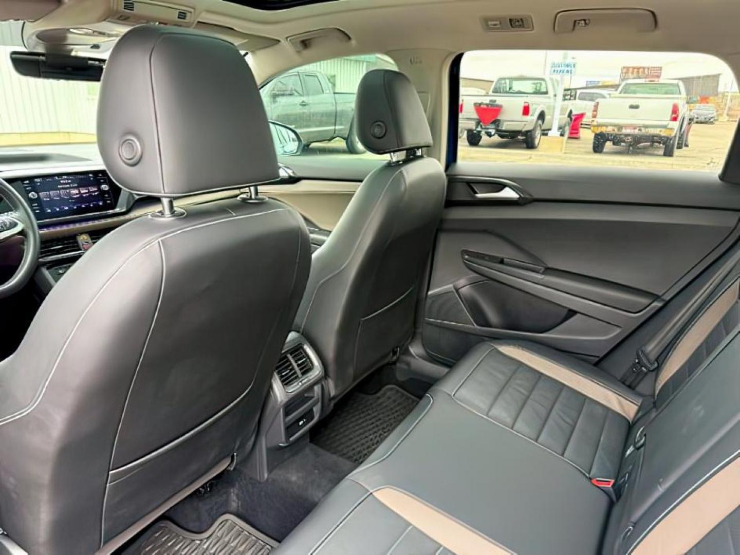 2022 Cornflower Blue /Gray/Black Volkswagen Taos (3VV2X7B2XNM) with an 15L I-4 gasoline direct injection engine, Automatic transmission, located at 1175 N Woodruff Ave, Idaho Falls, ID, 83401, 43.506901, -111.999657 - At Timberline Auto, finding a great deal on your next vehicle is always easy! Our experienced sales staff's goal is to help find you the right vehicle at the right price! Our knowledgeable finance department has options for almost any credit score. We offer extended service contract options to prote - Photo#22