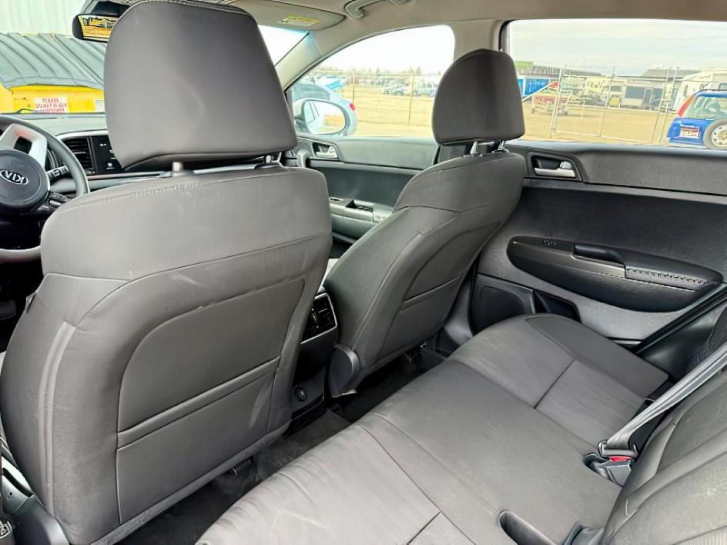 2021 Clear White /Black KIA Sportage (KNDPMCAC4M7) with an Theta II 24L I-4 gasoline direct injection engine, Automatic transmission, located at 1175 N Woodruff Ave, Idaho Falls, ID, 83401, 43.506901, -111.999657 - At Timberline Auto, finding a great deal on your next vehicle is always easy! Our experienced sales staff's goal is to help find you the right vehicle at the right price! Our knowledgeable finance department has options for almost any credit score. We offer extended service contract options to prote - Photo#24