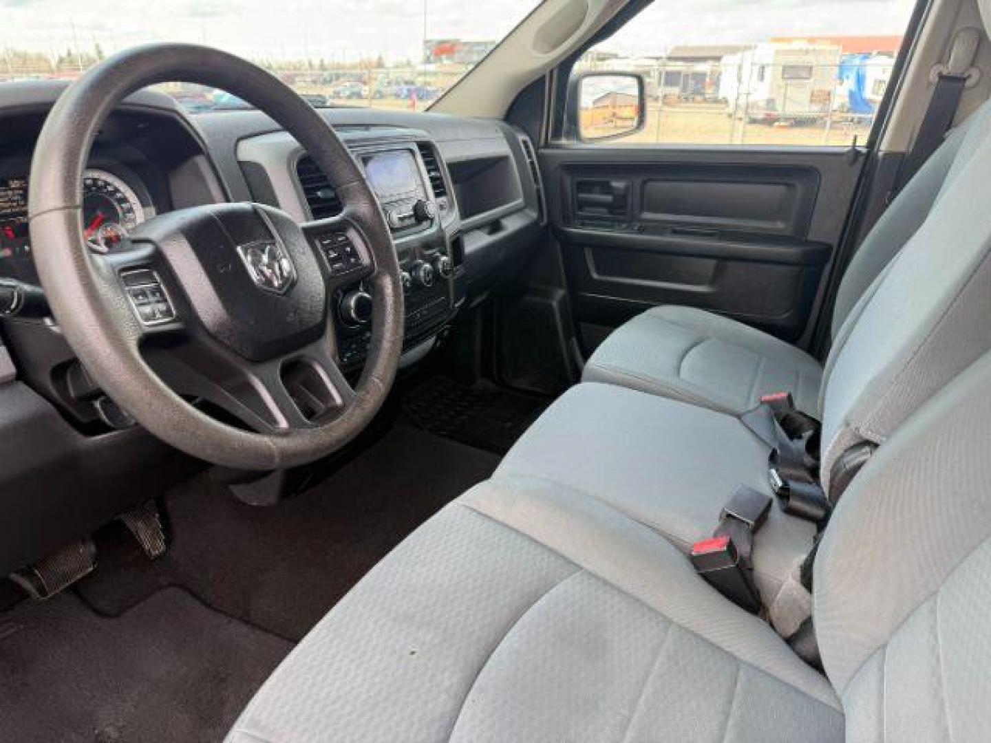 2013 BLACK /CLOTH Ram 1500 (1C6RR7FG7DS) with an 36 V6 engine, Automatic transmission, located at 1175 N Woodruff Ave, Idaho Falls, ID, 83401, 43.506901, -111.999657 - At Timberline Auto, finding a great deal on your next vehicle is always easy! Our experienced sales staff's goal is to help find you the right vehicle at the right price! Our knowledgeable finance department has options for almost any credit score. We offer extended service contract options to prote - Photo#12