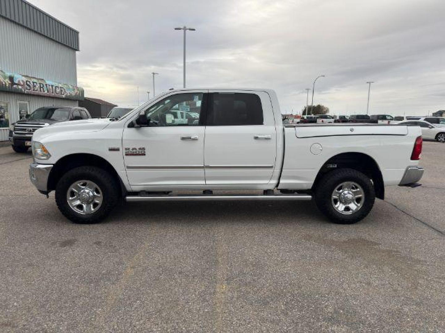 2015 Bright White Clearcoat /Diesel Gray/Black Ram 2500 SLT (3C6UR5DJ5FG) with an HEMI 6.4L V-8 VVT variable valve control engine, AUTOMATIC transmission, located at 1235 N Woodruff Ave., Idaho Falls, 83401, (208) 523-1053, 43.507172, -112.000488 - At Timberline Auto, finding a great deal on your next vehicle is always easy! Our experienced sales staff's goal is to help find you the right vehicle at the right price! Our knowledgeable finance department has options for almost any credit score. We offer extended service contract options to prote - Photo#24
