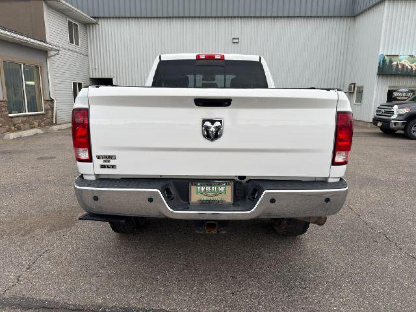 2015 Bright White Clearcoat /Diesel Gray/Black Ram 2500 SLT (3C6UR5DJ5FG) with an HEMI 6.4L V-8 VVT variable valve control engine, AUTOMATIC transmission, located at 1235 N Woodruff Ave., Idaho Falls, 83401, (208) 523-1053, 43.507172, -112.000488 - At Timberline Auto, finding a great deal on your next vehicle is always easy! Our experienced sales staff's goal is to help find you the right vehicle at the right price! Our knowledgeable finance department has options for almost any credit score. We offer extended service contract options to prote - Photo#26