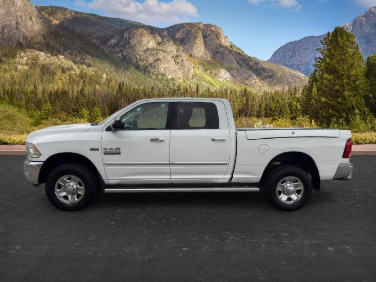 2015 Bright White Clearcoat /Diesel Gray/Black Ram 2500 SLT (3C6UR5DJ5FG) with an HEMI 6.4L V-8 VVT variable valve control engine, AUTOMATIC transmission, located at 1235 N Woodruff Ave., Idaho Falls, 83401, (208) 523-1053, 43.507172, -112.000488 - At Timberline Auto, finding a great deal on your next vehicle is always easy! Our experienced sales staff's goal is to help find you the right vehicle at the right price! Our knowledgeable finance department has options for almost any credit score. We offer extended service contract options to prote - Photo#1