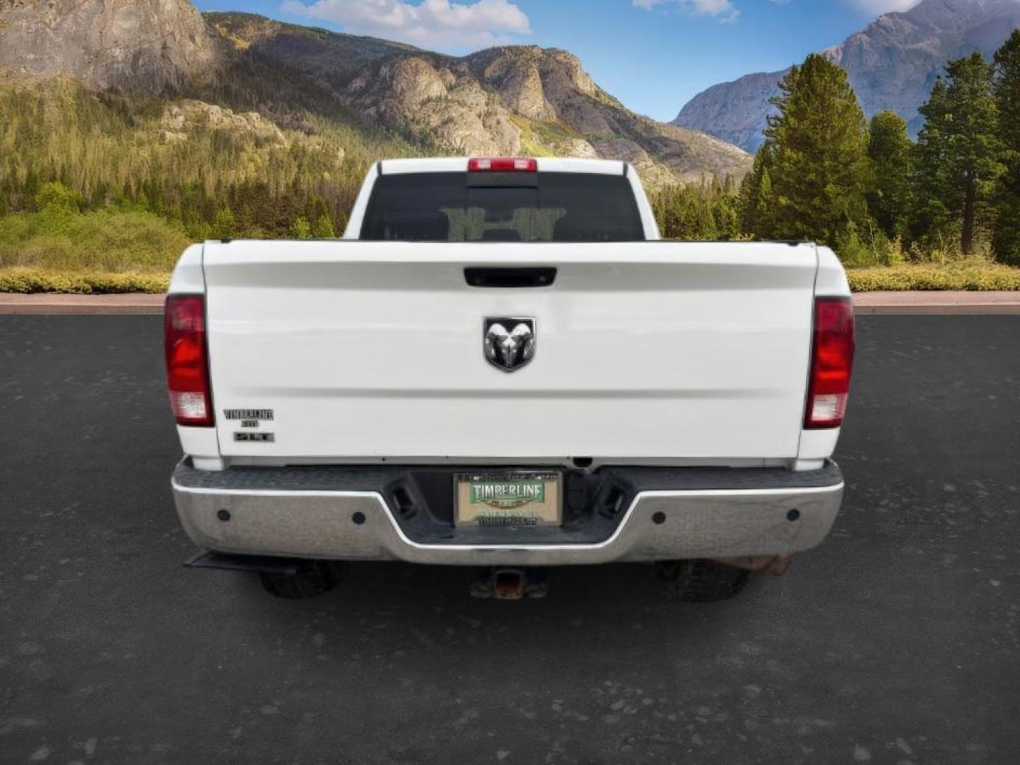 2015 Bright White Clearcoat /Diesel Gray/Black Ram 2500 SLT (3C6UR5DJ5FG) with an HEMI 6.4L V-8 VVT variable valve control engine, AUTOMATIC transmission, located at 1235 N Woodruff Ave., Idaho Falls, 83401, (208) 523-1053, 43.507172, -112.000488 - At Timberline Auto, finding a great deal on your next vehicle is always easy! Our experienced sales staff's goal is to help find you the right vehicle at the right price! Our knowledgeable finance department has options for almost any credit score. We offer extended service contract options to prote - Photo#3