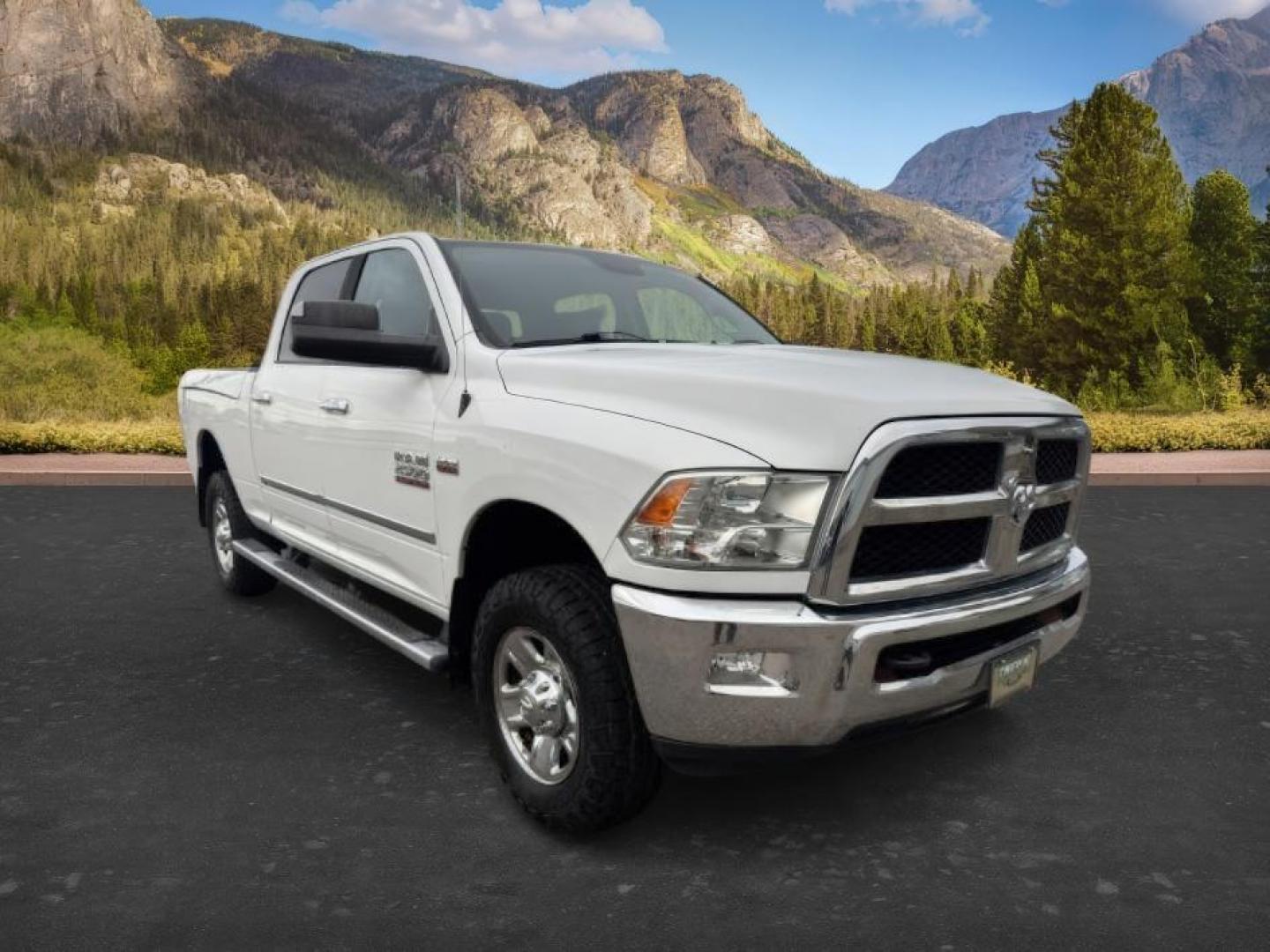 2015 Bright White Clearcoat /Diesel Gray/Black Ram 2500 SLT (3C6UR5DJ5FG) with an HEMI 6.4L V-8 VVT variable valve control engine, AUTOMATIC transmission, located at 1235 N Woodruff Ave., Idaho Falls, 83401, (208) 523-1053, 43.507172, -112.000488 - At Timberline Auto, finding a great deal on your next vehicle is always easy! Our experienced sales staff's goal is to help find you the right vehicle at the right price! Our knowledgeable finance department has options for almost any credit score. We offer extended service contract options to prote - Photo#7