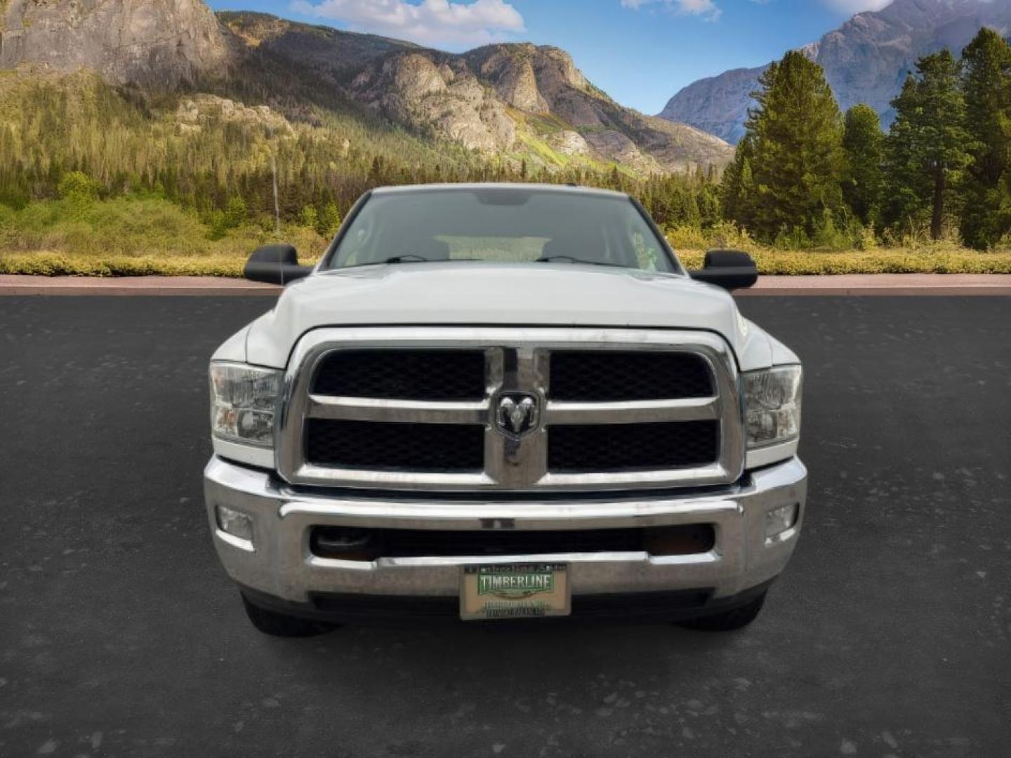2015 Bright White Clearcoat /Diesel Gray/Black Ram 2500 SLT (3C6UR5DJ5FG) with an HEMI 6.4L V-8 VVT variable valve control engine, AUTOMATIC transmission, located at 1235 N Woodruff Ave., Idaho Falls, 83401, (208) 523-1053, 43.507172, -112.000488 - At Timberline Auto, finding a great deal on your next vehicle is always easy! Our experienced sales staff's goal is to help find you the right vehicle at the right price! Our knowledgeable finance department has options for almost any credit score. We offer extended service contract options to prote - Photo#8