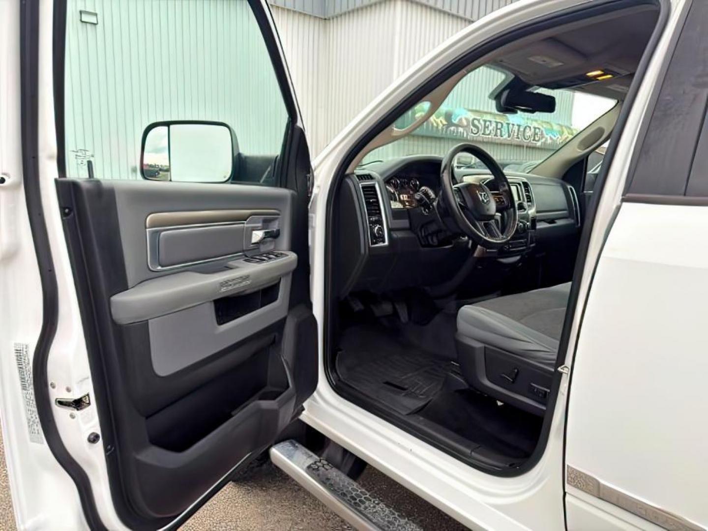 2015 Bright White Clearcoat /Diesel Gray/Black Ram 2500 SLT (3C6UR5DJ5FG) with an HEMI 6.4L V-8 VVT variable valve control engine, AUTOMATIC transmission, located at 1235 N Woodruff Ave., Idaho Falls, 83401, (208) 523-1053, 43.507172, -112.000488 - At Timberline Auto, finding a great deal on your next vehicle is always easy! Our experienced sales staff's goal is to help find you the right vehicle at the right price! Our knowledgeable finance department has options for almost any credit score. We offer extended service contract options to prote - Photo#11