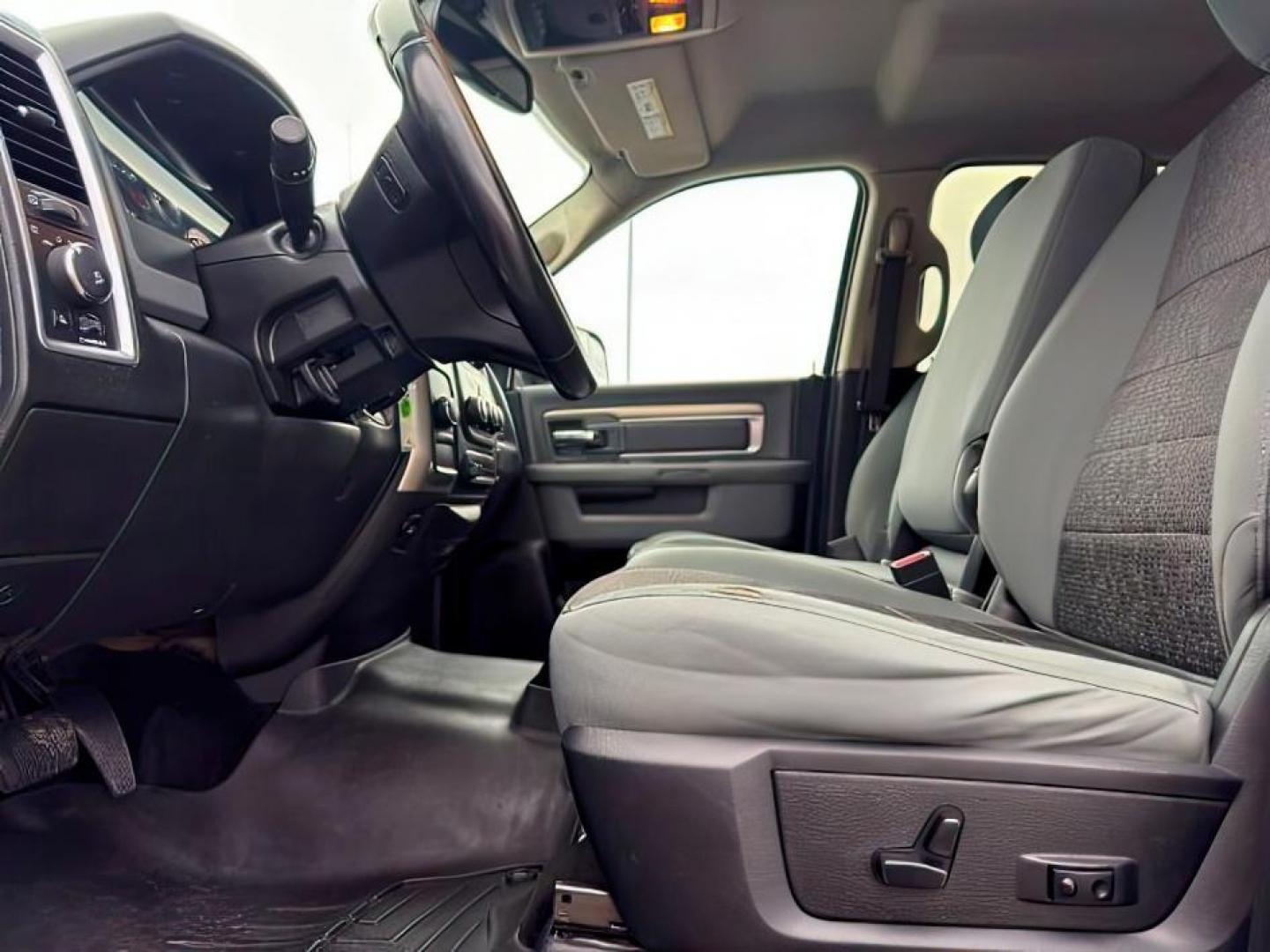 2015 Bright White Clearcoat /Diesel Gray/Black Ram 2500 SLT (3C6UR5DJ5FG) with an HEMI 6.4L V-8 VVT variable valve control engine, AUTOMATIC transmission, located at 1235 N Woodruff Ave., Idaho Falls, 83401, (208) 523-1053, 43.507172, -112.000488 - At Timberline Auto, finding a great deal on your next vehicle is always easy! Our experienced sales staff's goal is to help find you the right vehicle at the right price! Our knowledgeable finance department has options for almost any credit score. We offer extended service contract options to prote - Photo#12