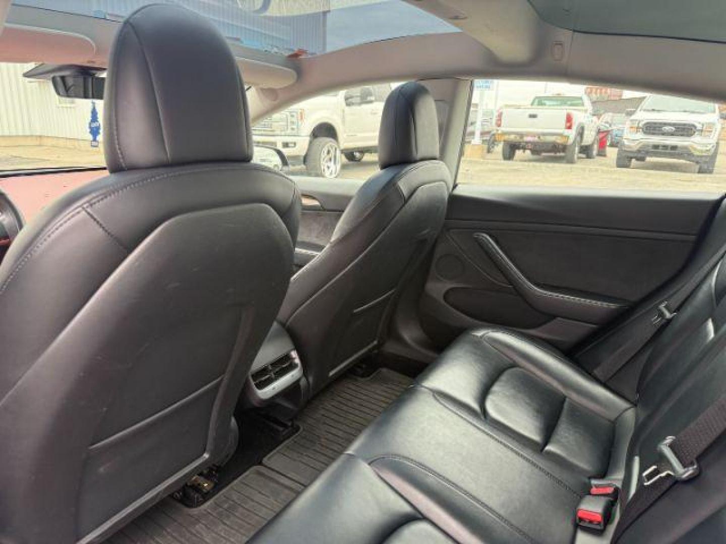 2022 BLACK /LEATHER Tesla Model 3 (5YJ3E1EBXNF) with an ELECTRIC engine, Automatic transmission, located at 1175 N Woodruff Ave, Idaho Falls, ID, 83401, 43.506901, -111.999657 - At Timberline Auto, finding a great deal on your next vehicle is always easy! Our experienced sales staff's goal is to help find you the right vehicle at the right price! Our knowledgeable finance department has options for almost any credit score. We offer extended service contract options to prote - Photo#40