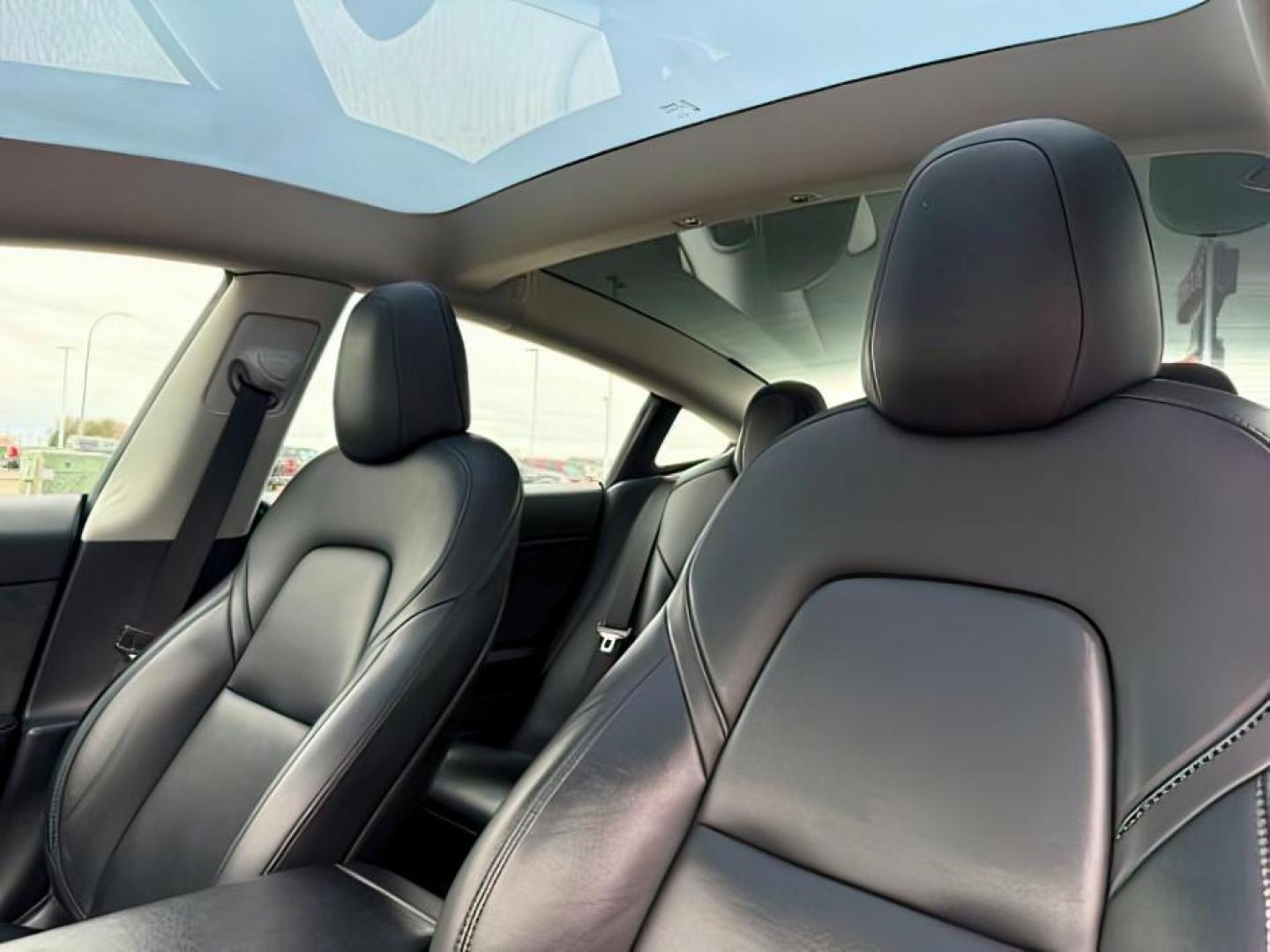 2022 BLACK /LEATHER Tesla Model 3 (5YJ3E1EBXNF) with an ELECTRIC engine, Automatic transmission, located at 1175 N Woodruff Ave, Idaho Falls, ID, 83401, 43.506901, -111.999657 - At Timberline Auto, finding a great deal on your next vehicle is always easy! Our experienced sales staff's goal is to help find you the right vehicle at the right price! Our knowledgeable finance department has options for almost any credit score. We offer extended service contract options to prote - Photo#16