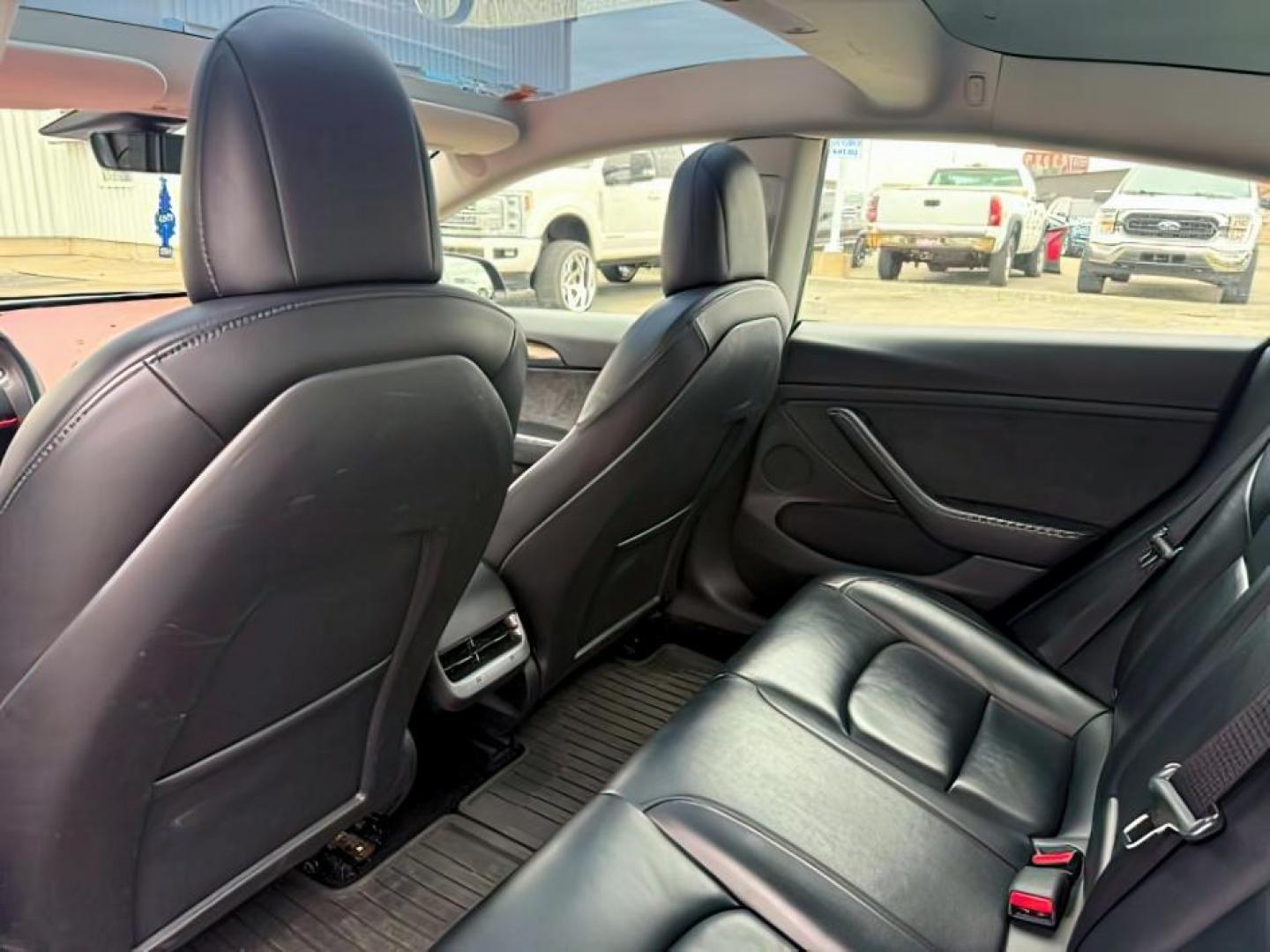 2022 BLACK /LEATHER Tesla Model 3 (5YJ3E1EBXNF) with an ELECTRIC engine, Automatic transmission, located at 1175 N Woodruff Ave, Idaho Falls, ID, 83401, 43.506901, -111.999657 - At Timberline Auto, finding a great deal on your next vehicle is always easy! Our experienced sales staff's goal is to help find you the right vehicle at the right price! Our knowledgeable finance department has options for almost any credit score. We offer extended service contract options to prote - Photo#19