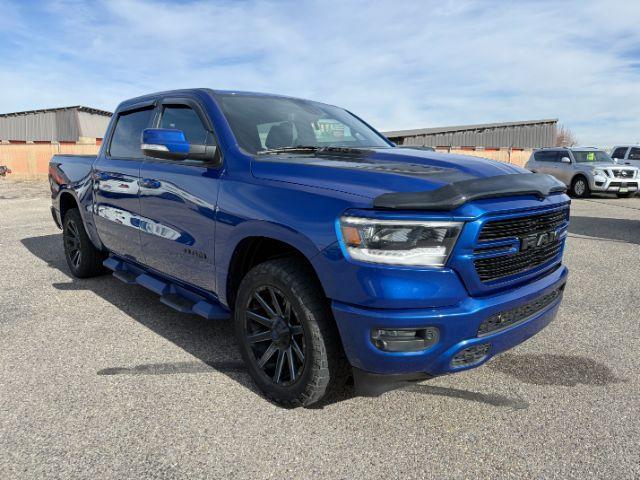 2019 BLUE /Black Ram 1500 Rebel (1C6SRFLT0KN) with an HEMI 5.7L V-8 variable valve control engine, AUTOMATIC transmission, located at 1235 N Woodruff Ave., Idaho Falls, 83401, (208) 523-1053, 43.507172, -112.000488 - This 2019 Ram 1500 HEMI Sport stands out instantly with its eye-catching blue finish paired with matching blue Fuel wheels that give it a bold, custom street presence. Powered by a 5.7L HEMI V8, it brings strong, responsive performance that fits just as well for daily driving as it does for hauling- Photo#33