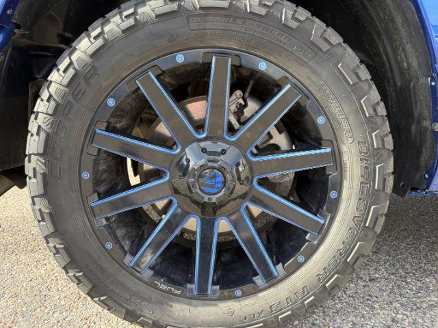2019 BLUE /Black Ram 1500 Rebel (1C6SRFLT0KN) with an HEMI 5.7L V-8 variable valve control engine, AUTOMATIC transmission, located at 1235 N Woodruff Ave., Idaho Falls, 83401, (208) 523-1053, 43.507172, -112.000488 - This 2019 Ram 1500 HEMI Sport stands out instantly with its eye-catching blue finish paired with matching blue Fuel wheels that give it a bold, custom street presence. Powered by a 5.7L HEMI V8, it brings strong, responsive performance that fits just as well for daily driving as it does for hauling- Photo#36