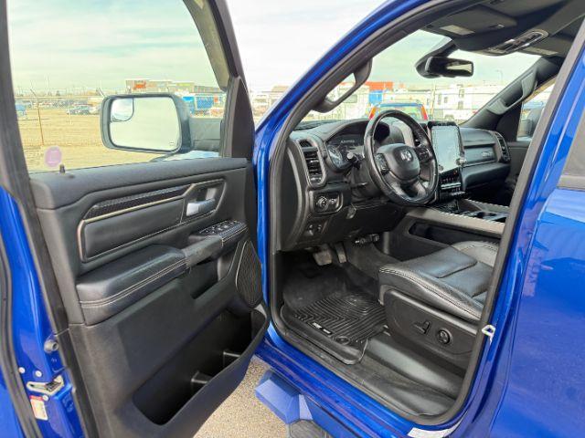 2019 BLUE /Black Ram 1500 Rebel (1C6SRFLT0KN) with an HEMI 5.7L V-8 variable valve control engine, AUTOMATIC transmission, located at 1235 N Woodruff Ave., Idaho Falls, 83401, (208) 523-1053, 43.507172, -112.000488 - This 2019 Ram 1500 HEMI Sport stands out instantly with its eye-catching blue finish paired with matching blue Fuel wheels that give it a bold, custom street presence. Powered by a 5.7L HEMI V8, it brings strong, responsive performance that fits just as well for daily driving as it does for hauling- Photo#37