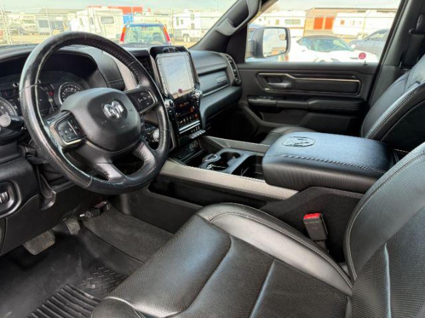 2019 BLUE /Black Ram 1500 (1C6SRFLT0KN) with an HEMI 57L V-8 variable valve control engine, Automatic transmission, located at 1175 N Woodruff Ave, Idaho Falls, ID, 83401, 43.506901, -111.999657 - At Timberline Auto, finding a great deal on your next vehicle is always easy! Our experienced sales staff's goal is to help find you the right vehicle at the right price! Our knowledgeable finance department has options for almost any credit score. We offer extended service contract options to prote - Photo#39