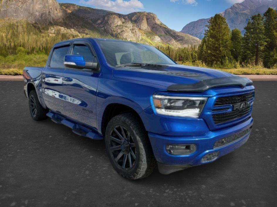2019 BLUE /Black Ram 1500 Rebel (1C6SRFLT0KN) with an HEMI 5.7L V-8 variable valve control engine, AUTOMATIC transmission, located at 1235 N Woodruff Ave., Idaho Falls, 83401, (208) 523-1053, 43.507172, -112.000488 - This 2019 Ram 1500 HEMI Sport stands out instantly with its eye-catching blue finish paired with matching blue Fuel wheels that give it a bold, custom street presence. Powered by a 5.7L HEMI V8, it brings strong, responsive performance that fits just as well for daily driving as it does for hauling- Photo#7