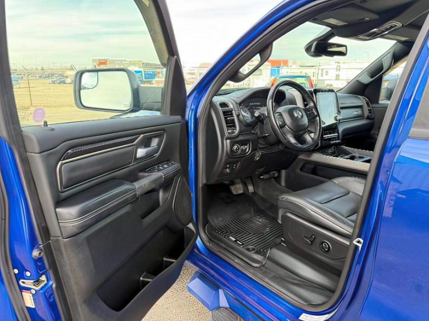 2019 BLUE /Black Ram 1500 (1C6SRFLT0KN) with an HEMI 57L V-8 variable valve control engine, Automatic transmission, located at 1175 N Woodruff Ave, Idaho Falls, ID, 83401, 43.506901, -111.999657 - At Timberline Auto, finding a great deal on your next vehicle is always easy! Our experienced sales staff's goal is to help find you the right vehicle at the right price! Our knowledgeable finance department has options for almost any credit score. We offer extended service contract options to prote - Photo#11