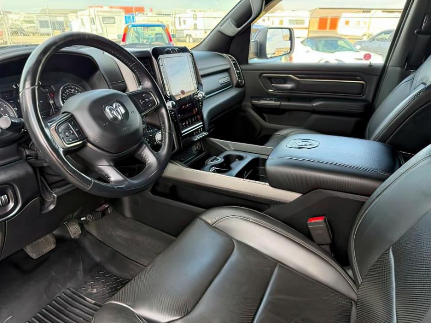 2019 BLUE /Black Ram 1500 (1C6SRFLT0KN) with an HEMI 57L V-8 variable valve control engine, Automatic transmission, located at 1175 N Woodruff Ave, Idaho Falls, ID, 83401, 43.506901, -111.999657 - At Timberline Auto, finding a great deal on your next vehicle is always easy! Our experienced sales staff's goal is to help find you the right vehicle at the right price! Our knowledgeable finance department has options for almost any credit score. We offer extended service contract options to prote - Photo#13