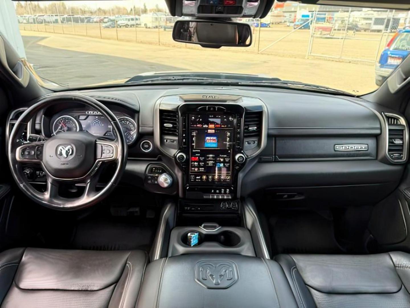 2019 BLUE /Black Ram 1500 (1C6SRFLT0KN) with an HEMI 57L V-8 variable valve control engine, Automatic transmission, located at 1175 N Woodruff Ave, Idaho Falls, ID, 83401, 43.506901, -111.999657 - At Timberline Auto, finding a great deal on your next vehicle is always easy! Our experienced sales staff's goal is to help find you the right vehicle at the right price! Our knowledgeable finance department has options for almost any credit score. We offer extended service contract options to prote - Photo#22