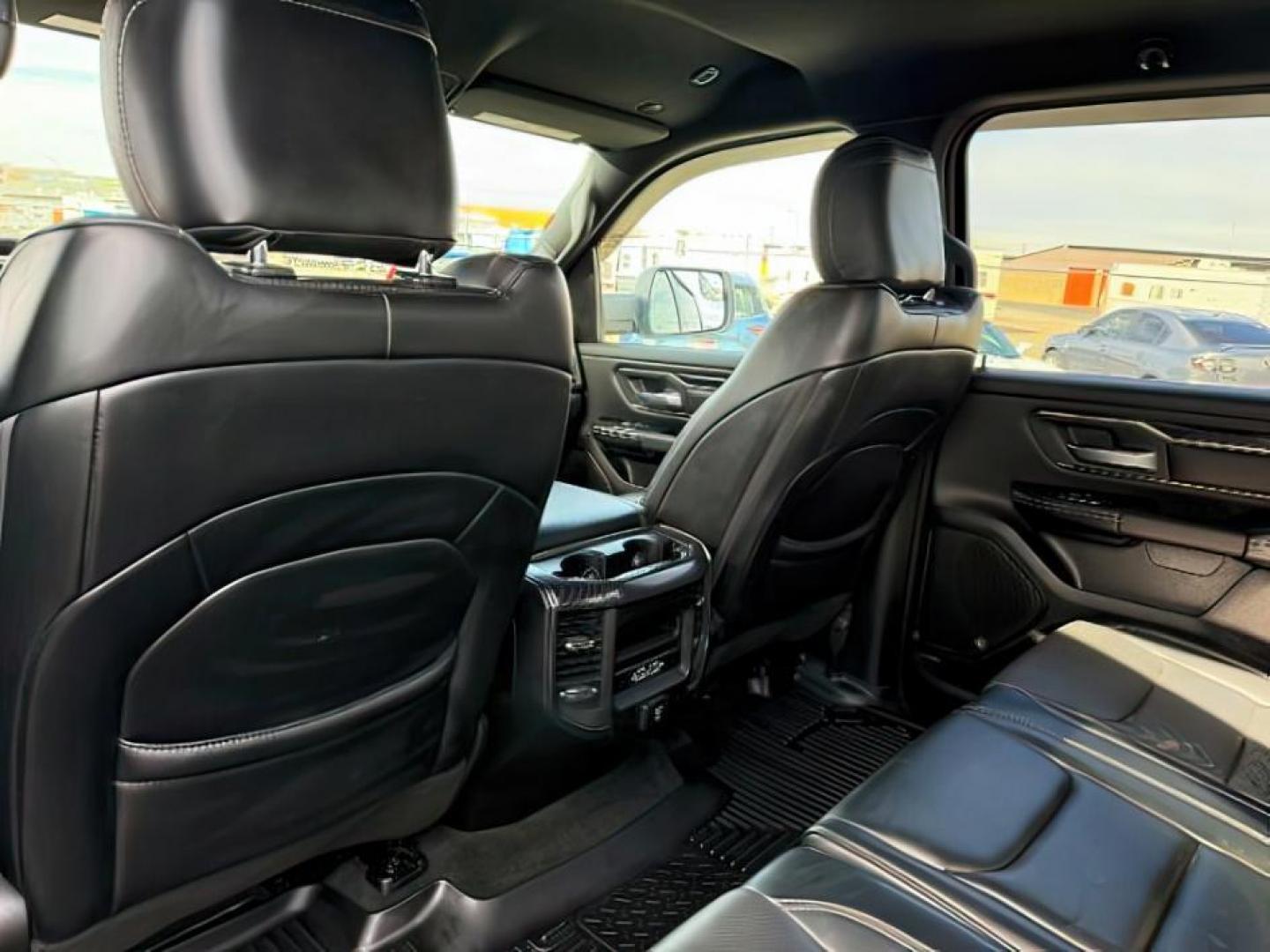 2019 BLUE /Black Ram 1500 (1C6SRFLT0KN) with an HEMI 57L V-8 variable valve control engine, Automatic transmission, located at 1175 N Woodruff Ave, Idaho Falls, ID, 83401, 43.506901, -111.999657 - At Timberline Auto, finding a great deal on your next vehicle is always easy! Our experienced sales staff's goal is to help find you the right vehicle at the right price! Our knowledgeable finance department has options for almost any credit score. We offer extended service contract options to prote - Photo#24
