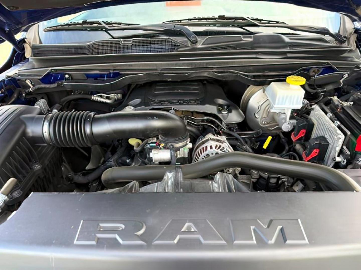 2019 BLUE /Black Ram 1500 (1C6SRFLT0KN) with an HEMI 57L V-8 variable valve control engine, Automatic transmission, located at 1175 N Woodruff Ave, Idaho Falls, ID, 83401, 43.506901, -111.999657 - At Timberline Auto, finding a great deal on your next vehicle is always easy! Our experienced sales staff's goal is to help find you the right vehicle at the right price! Our knowledgeable finance department has options for almost any credit score. We offer extended service contract options to prote - Photo#25