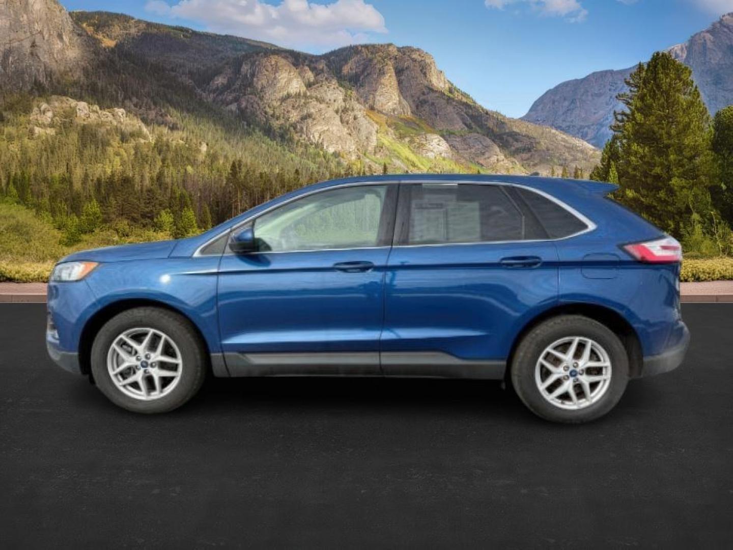 2021 BLUE /Ebony Ford Edge (2FMPK4J91MB) with an EcoBoost 2L I-4 gasoline direct injection engine, Automatic transmission, located at 1175 N Woodruff Ave, Idaho Falls, ID, 83401, 43.506901, -111.999657 - At Timberline Auto, finding a great deal on your next vehicle is always easy! Our experienced sales staff's goal is to help find you the right vehicle at the right price! Our knowledgeable finance department has options for almost any credit score. We offer extended service contract options to prote - Photo#0