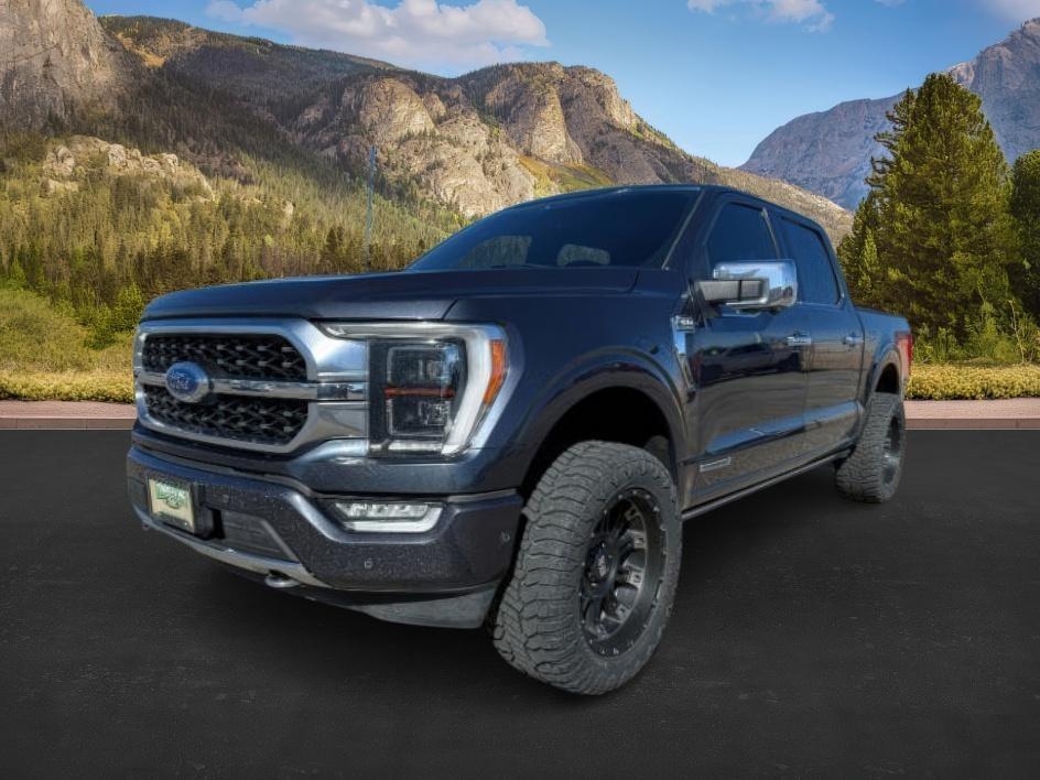 2021 BLUE /Black Ford F-150 Platinum (1FTFW1ED2MF) with an 3.5L V6 POWER BOOST HYBRID engine, AUTOMATIC transmission, located at 1235 N Woodruff Ave., Idaho Falls, 83401, (208) 523-1053, 43.507172, -112.000488 - At Timberline Auto, finding a great deal on your next vehicle is always easy! Our experienced sales staff's goal is to help find you the right vehicle at the right price! Our knowledgeable finance department has options for almost any credit score. We offer extended service contract options to prote- Photo#0