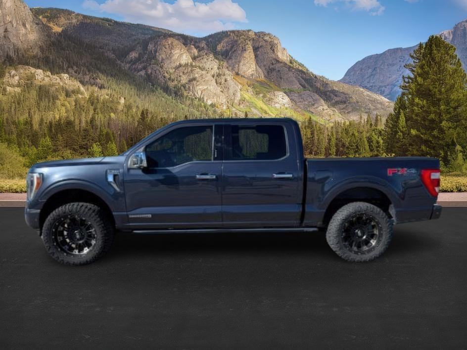 2021 BLUE /Black Ford F-150 Platinum (1FTFW1ED2MF) with an 3.5L V6 POWER BOOST HYBRID engine, AUTOMATIC transmission, located at 1235 N Woodruff Ave., Idaho Falls, 83401, (208) 523-1053, 43.507172, -112.000488 - At Timberline Auto, finding a great deal on your next vehicle is always easy! Our experienced sales staff's goal is to help find you the right vehicle at the right price! Our knowledgeable finance department has options for almost any credit score. We offer extended service contract options to prote- Photo#1