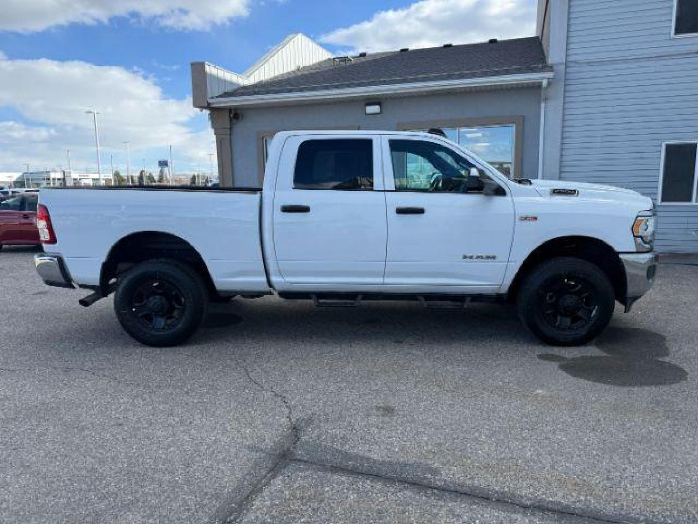 2021 WHITE /Diesel Gray/Black Ram 2500 (3C6UR5CJ0MG) with an HEMI 64L V-8 VVT variable valve control engine, Automatic transmission, located at 1175 N Woodruff Ave, Idaho Falls, ID, 83401, 43.506901, -111.999657 - At Timberline Auto, finding a great deal on your next vehicle is always easy! Our experienced sales staff's goal is to help find you the right vehicle at the right price! Our knowledgeable finance department has options for almost any credit score. We offer extended service contract options to prote - Photo#33