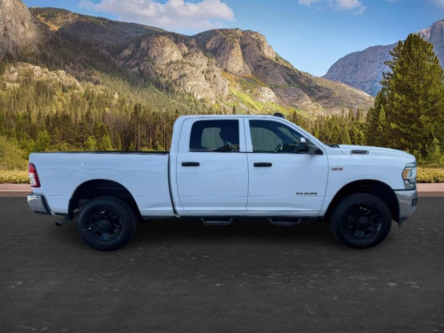 2021 WHITE /Diesel Gray/Black Ram 2500 (3C6UR5CJ0MG) with an HEMI 64L V-8 VVT variable valve control engine, Automatic transmission, located at 1175 N Woodruff Ave, Idaho Falls, ID, 83401, 43.506901, -111.999657 - At Timberline Auto, finding a great deal on your next vehicle is always easy! Our experienced sales staff's goal is to help find you the right vehicle at the right price! Our knowledgeable finance department has options for almost any credit score. We offer extended service contract options to prote - Photo#7