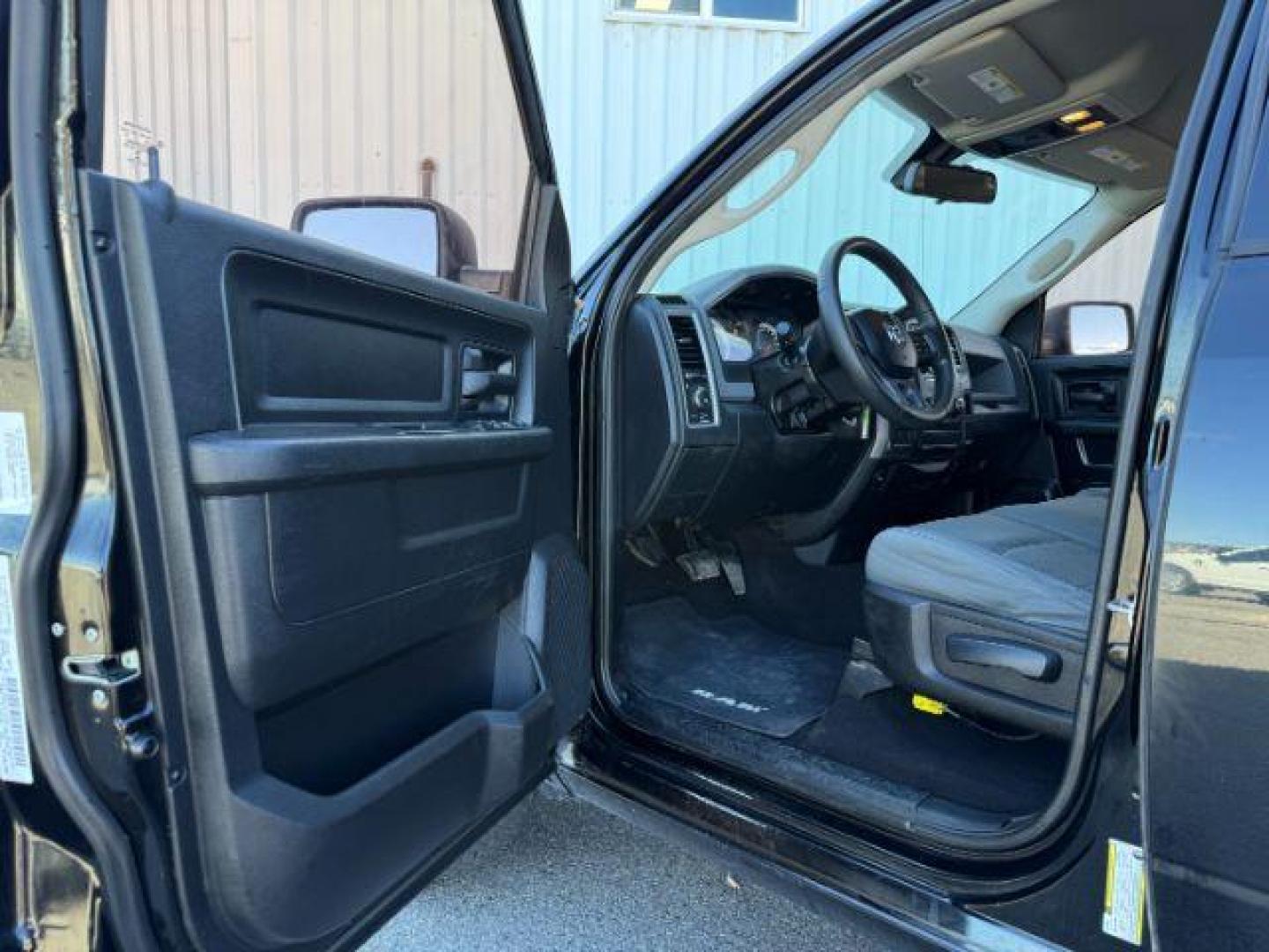 2014 Black Clearcoat /Diesel Gray/Black Ram 1500 (1C6RR7FT9ES) with an HEMI 57L V-8 variable valve control engine, Automatic transmission, located at 1175 N Woodruff Ave, Idaho Falls, ID, 83401, 43.506901, -111.999657 - At Timberline Auto, finding a great deal on your next vehicle is always easy! Our experienced sales staff's goal is to help find you the right vehicle at the right price! Our knowledgeable finance department has options for almost any credit score. We offer extended service contract options to prote - Photo#28