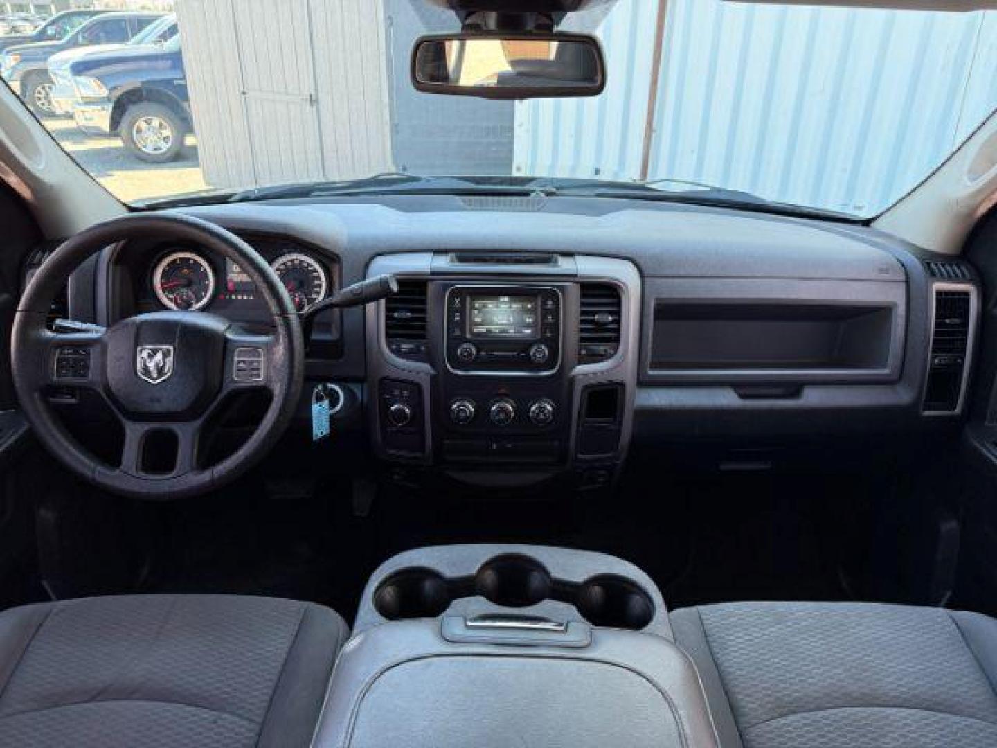 2014 Black Clearcoat /Diesel Gray/Black Ram 1500 (1C6RR7FT9ES) with an HEMI 57L V-8 variable valve control engine, Automatic transmission, located at 1175 N Woodruff Ave, Idaho Falls, ID, 83401, 43.506901, -111.999657 - At Timberline Auto, finding a great deal on your next vehicle is always easy! Our experienced sales staff's goal is to help find you the right vehicle at the right price! Our knowledgeable finance department has options for almost any credit score. We offer extended service contract options to prote - Photo#37