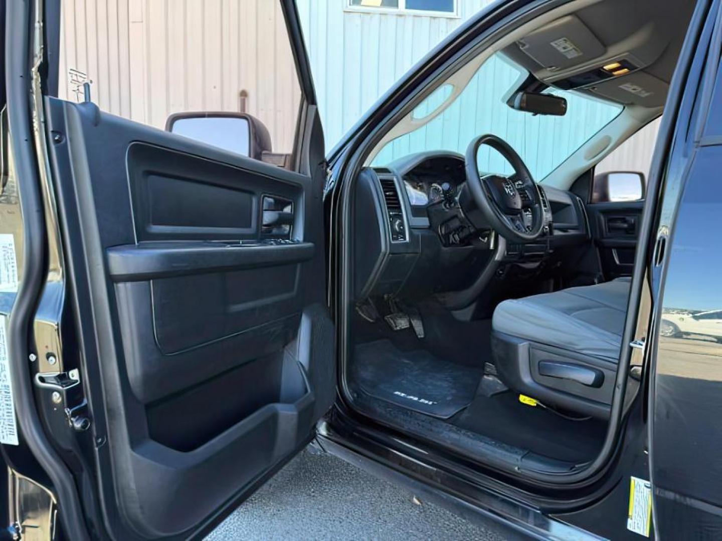 2014 Black Clearcoat /Diesel Gray/Black Ram 1500 (1C6RR7FT9ES) with an HEMI 57L V-8 variable valve control engine, Automatic transmission, located at 1175 N Woodruff Ave, Idaho Falls, ID, 83401, 43.506901, -111.999657 - At Timberline Auto, finding a great deal on your next vehicle is always easy! Our experienced sales staff's goal is to help find you the right vehicle at the right price! Our knowledgeable finance department has options for almost any credit score. We offer extended service contract options to prote - Photo#8