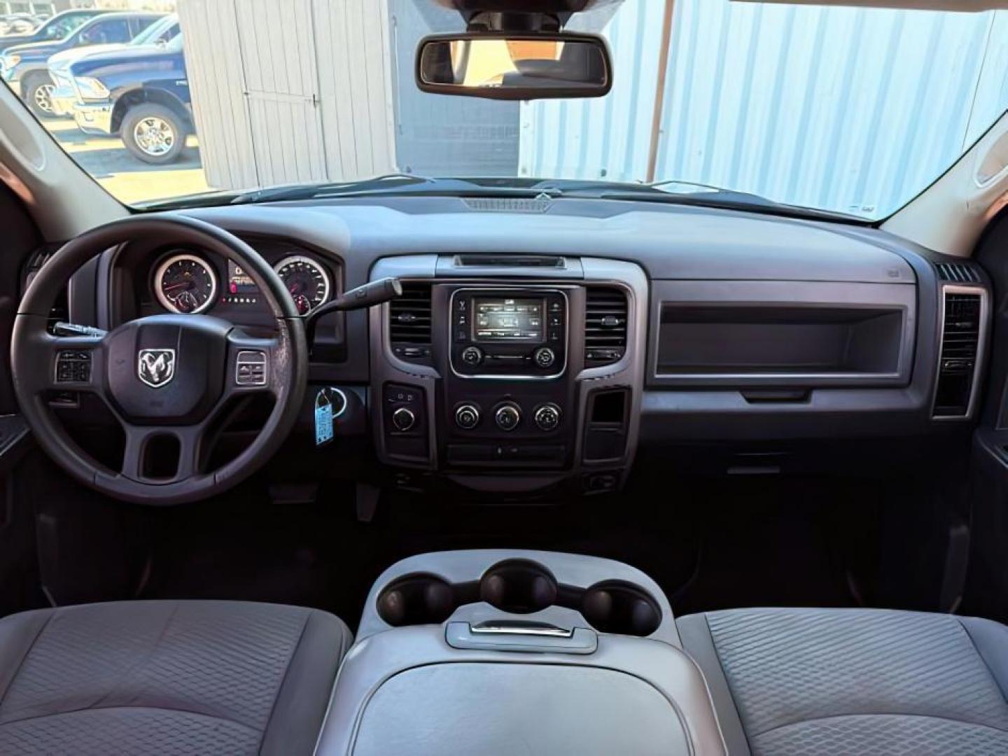 2014 Black Clearcoat /Diesel Gray/Black Ram 1500 (1C6RR7FT9ES) with an HEMI 57L V-8 variable valve control engine, Automatic transmission, located at 1175 N Woodruff Ave, Idaho Falls, ID, 83401, 43.506901, -111.999657 - At Timberline Auto, finding a great deal on your next vehicle is always easy! Our experienced sales staff's goal is to help find you the right vehicle at the right price! Our knowledgeable finance department has options for almost any credit score. We offer extended service contract options to prote - Photo#17