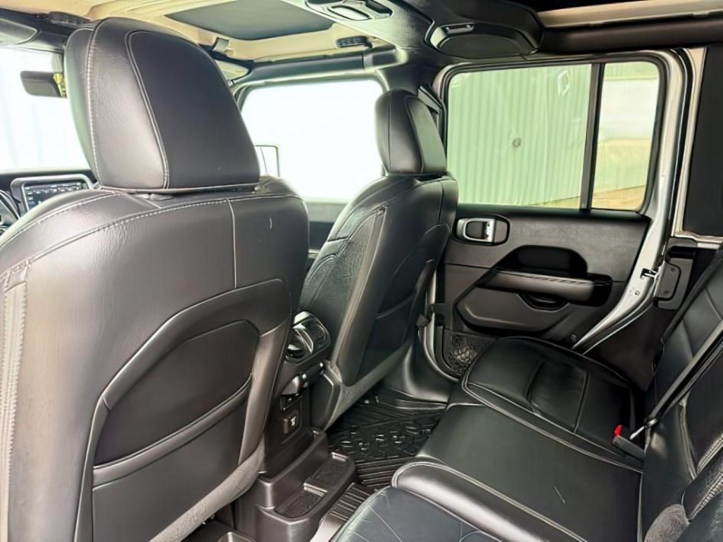 2018 SILVER /Black/Black Jeep Wrangler Unlimited Sahara (1C4HJXEN7JW) with an 2L I-4 gasoline direct injection engine, AUTOMATIC transmission, located at 1235 N Woodruff Ave., Idaho Falls, 83401, (208) 523-1053, 43.507172, -112.000488 - At Timberline Auto, finding a great deal on your next vehicle is always easy! Our experienced sales staff's goal is to help find you the right vehicle at the right price! Our knowledgeable finance department has options for almost any credit score. We offer extended service contract options to prote - Photo#25