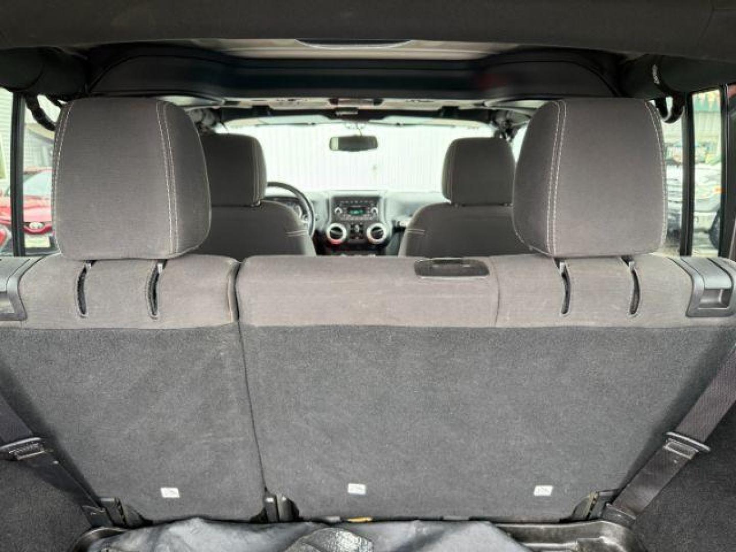 2017 GRAY /Black Jeep Wrangler Unlimited Sahara 4x4 (1C4BJWEG0HL) with an Pentastar 3.6L V-6 DOHC engine, AUTOMATIC transmission - At Timberline Auto, finding a great deal on your next vehicle is always easy! Our experienced sales staff's goal is to help find you the right vehicle at the right price! Our knowledgeable finance department has options for almost any credit score. We offer extended service contract options to prote - Photo#26