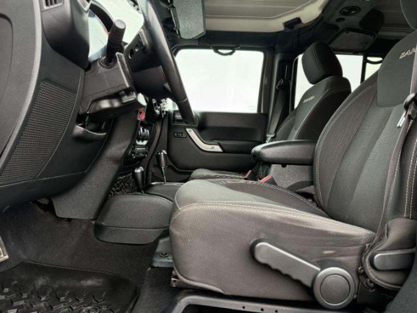 2017 GRAY /Black Jeep Wrangler Unlimited Sahara 4x4 (1C4BJWEG0HL) with an Pentastar 3.6L V-6 DOHC engine, AUTOMATIC transmission - At Timberline Auto, finding a great deal on your next vehicle is always easy! Our experienced sales staff's goal is to help find you the right vehicle at the right price! Our knowledgeable finance department has options for almost any credit score. We offer extended service contract options to prote - Photo#34