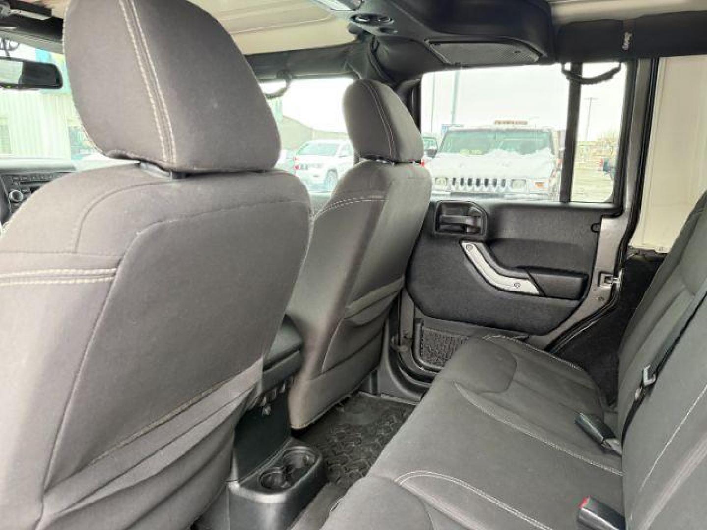 2017 GRAY /Black Jeep Wrangler Unlimited Sahara 4x4 (1C4BJWEG0HL) with an Pentastar 3.6L V-6 DOHC engine, AUTOMATIC transmission - At Timberline Auto, finding a great deal on your next vehicle is always easy! Our experienced sales staff's goal is to help find you the right vehicle at the right price! Our knowledgeable finance department has options for almost any credit score. We offer extended service contract options to prote - Photo#42