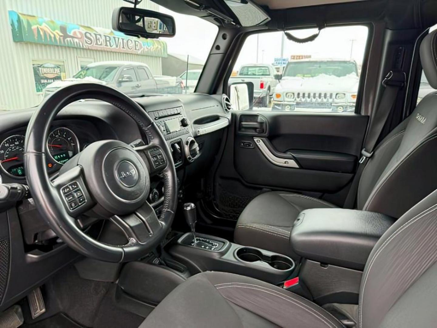 2017 GRAY /Black Jeep Wrangler Unlimited Sahara 4x4 (1C4BJWEG0HL) with an Pentastar 3.6L V-6 DOHC engine, AUTOMATIC transmission - At Timberline Auto, finding a great deal on your next vehicle is always easy! Our experienced sales staff's goal is to help find you the right vehicle at the right price! Our knowledgeable finance department has options for almost any credit score. We offer extended service contract options to prote - Photo#13