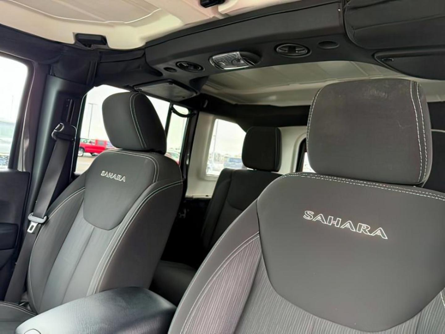 2017 GRAY /Black Jeep Wrangler Unlimited Sahara 4x4 (1C4BJWEG0HL) with an Pentastar 3.6L V-6 DOHC engine, AUTOMATIC transmission - At Timberline Auto, finding a great deal on your next vehicle is always easy! Our experienced sales staff's goal is to help find you the right vehicle at the right price! Our knowledgeable finance department has options for almost any credit score. We offer extended service contract options to prote - Photo#17